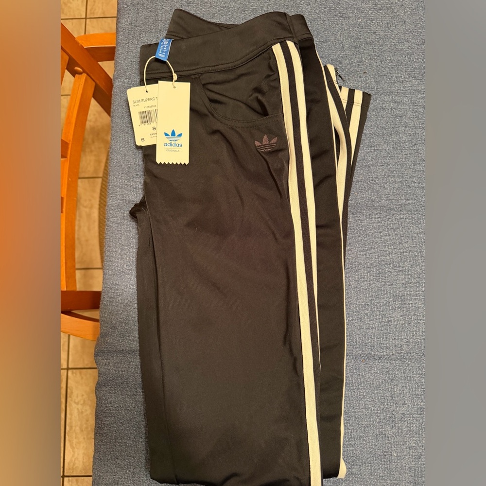 Adidas Woman’s Slim Black Training Pants with White Stripes pockets